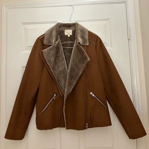 Brown suede coat with cozy inside. Stylish, warm, & comfortable.